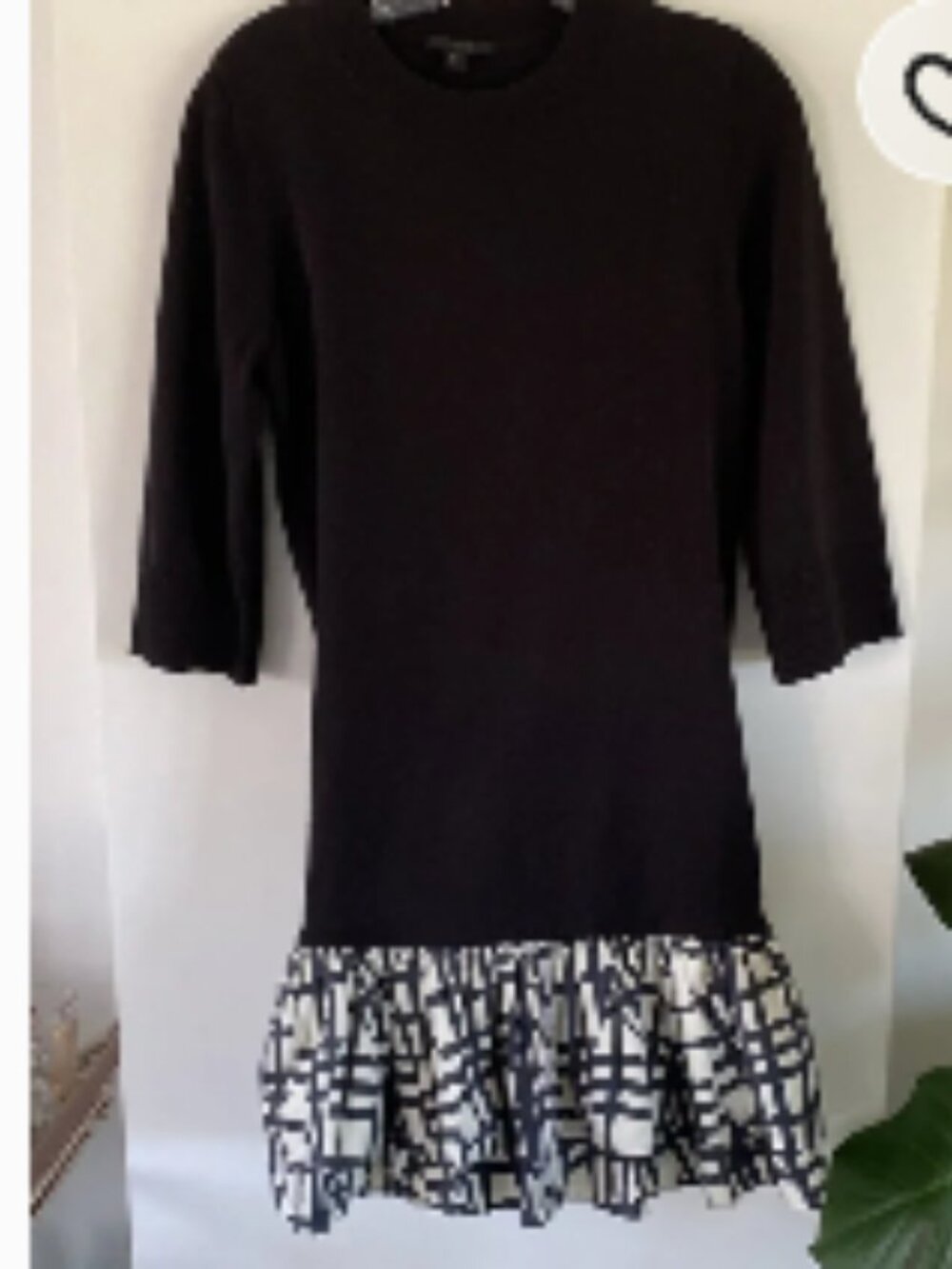 Black Knit Dress with Printed Ruffle Hem